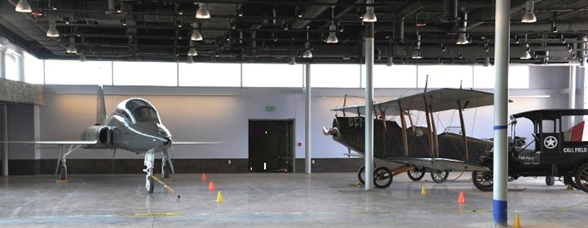 A T-38 Talon from the Euro-NATO Joint Jet Pilot Training program, Sheppard Air Force Base, Texas, sits in the new Wichita Falls Municipal Airport terminal as part of the "Jenny to Jet" heritage of flight exhibit Dec. 1, 2014. Since T-38 suffered nose and undercarriage damage during a landing mishap in 2012, the decision was made to transfer it to the city of Wichita Falls through the government supply process system. A team of more than 60 volunteers from Sheppard worked in their free time from April through October 2014 to restore the aircraft. (U.S. Air Force photo/Debi Smith)   