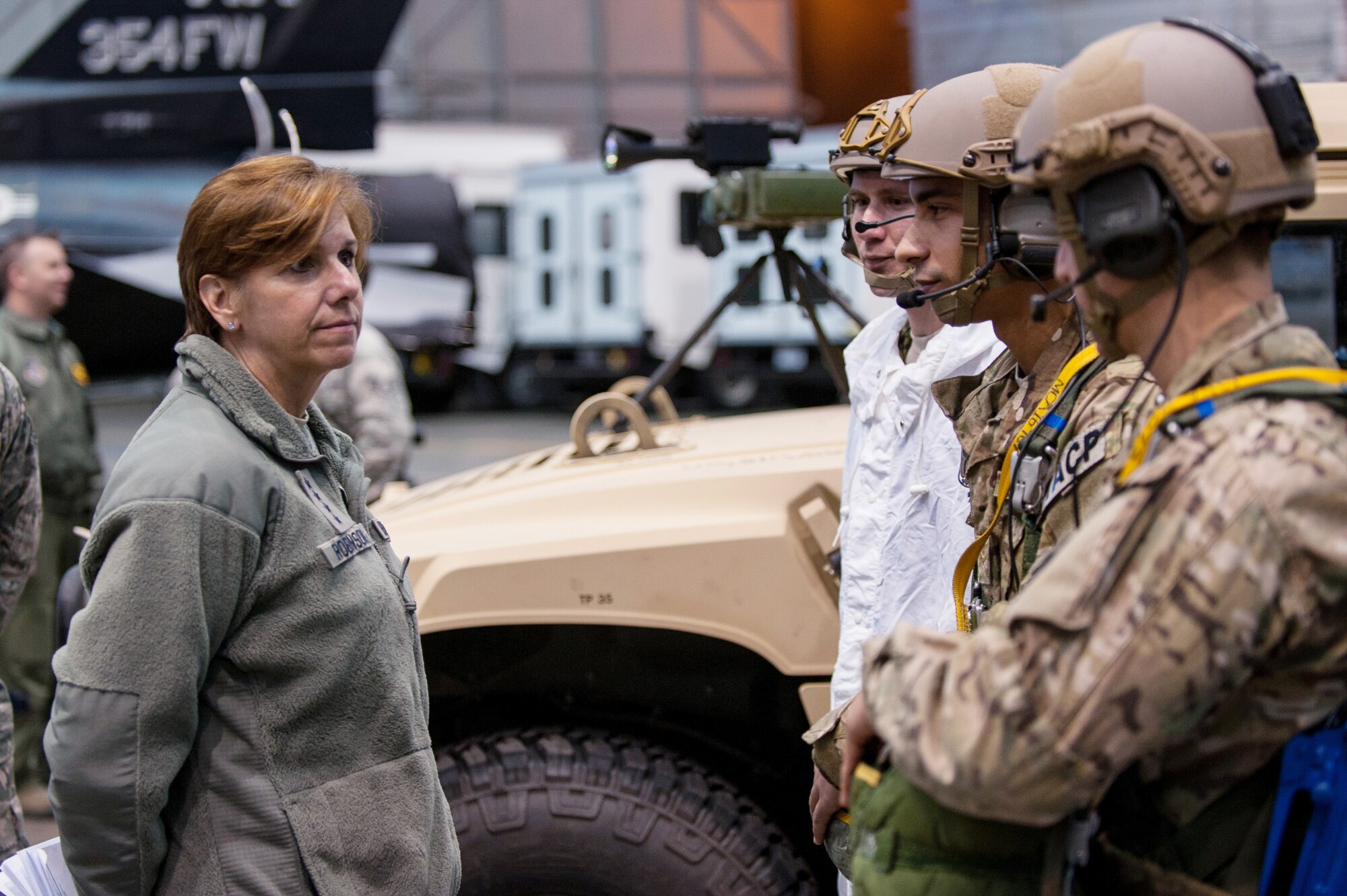 U.S. Air Force Gen. Lori Robinson, the Pacific Air Forces commander, speaks with Airmen assigned to Detachment 1, 3rd Air Support Operations Squadron, Dec. 4, 2014, at Eielson Air Force Base, Alaska. During her trip to Eielson, Robinson visited Airmen and families and witnessed Eielson missions and operations with Chief Master Sgt. Buddy Hutchison, the PACAF command chief. (U.S. Air Force photo by Tech. Sgt. Joseph Swafford/Released)