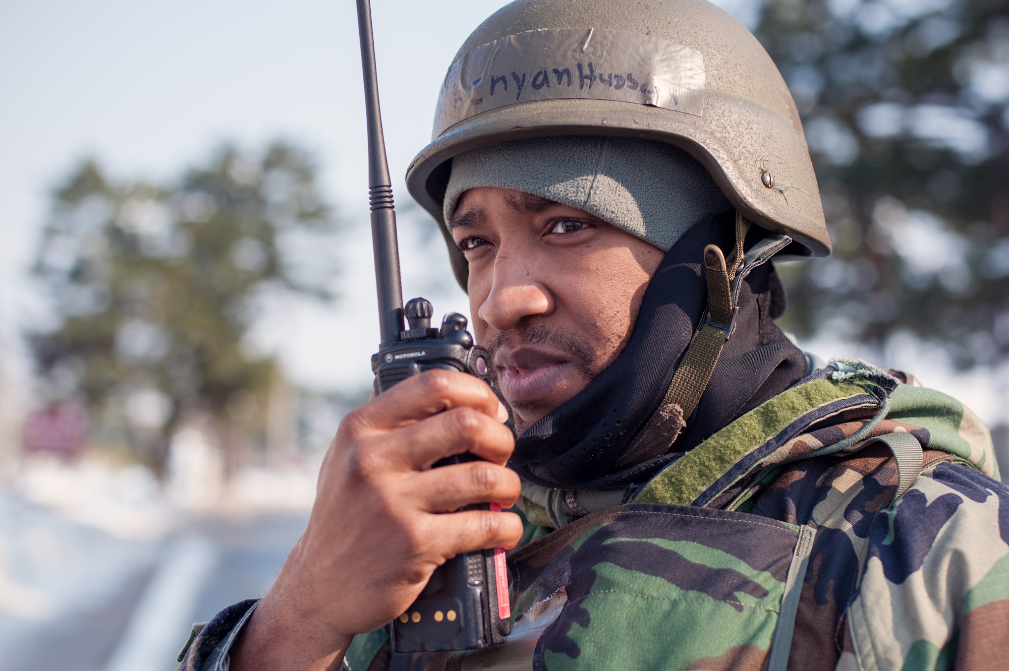 Staff Sgt. Kenyan Hudson, 8th Comptroller Squadron deputy dispersing officer, calls in a simulated unexploded ordinance device during Exercise Beverly Bulldog 15-1 at Kunsan Air Base, Republic of Korea, Dec. 8, 2014. The eight-day exercise took place in an austere environment that tested the Wolf Pack’s ability to respond to wartime and armistice threats. (U.S. Air Force photo by Senior Airman Taylor Curry/Released)