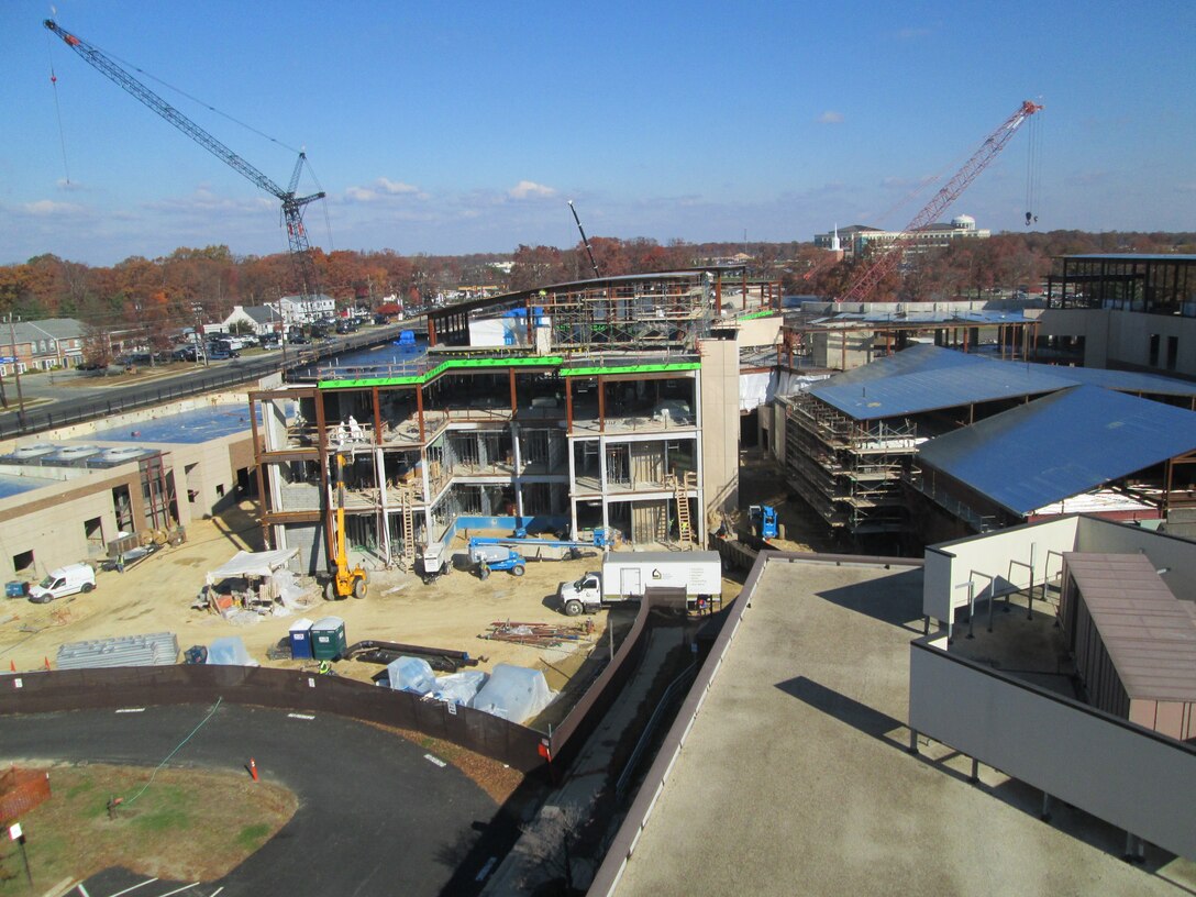 Construction on the new Malcolm Grow Medical Clinics and Surgery Center (MGMCSC) is beginning to take shape and the walls are going up. The new multi-story building will encompass more than 300,000 square feet and will be home to an ambulatory care and surgery center, emergent care center, physical and occupational therapy, family health facilities and space for specialty clinics and other ancillary services. The project includes the construction of a new dental clinic, which will be co-located within the main medical campus providing ease of access for patients and staff. (AF Photo by Melanie Moore)


