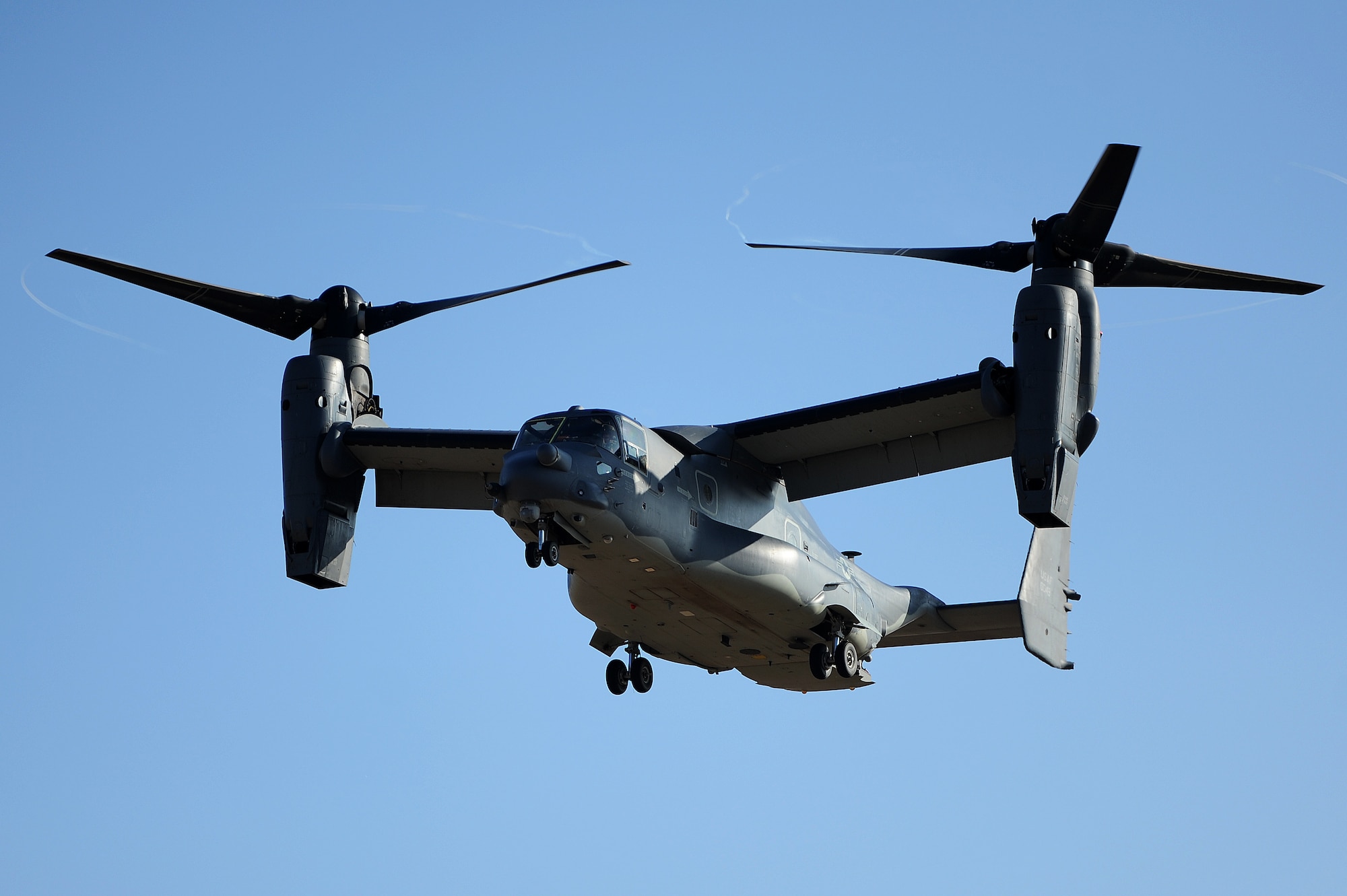 GOODFELLOW AIR FORCE BASE, Texas – A CV-22 Osprey from Cannon Air Force Base prepares to land on base Dec. 8. The CV-22 Osprey is a tilt rotor aircraft that is capable of the take-off and landing qualities of a helicopter with the fuel efficiency and speed of a turboprop aircraft. Its mission is to conduct long-range infiltration, exfiltration and resupply missions. (U.S. Air Force photo/ Airman 1st Class Devin Boyer)