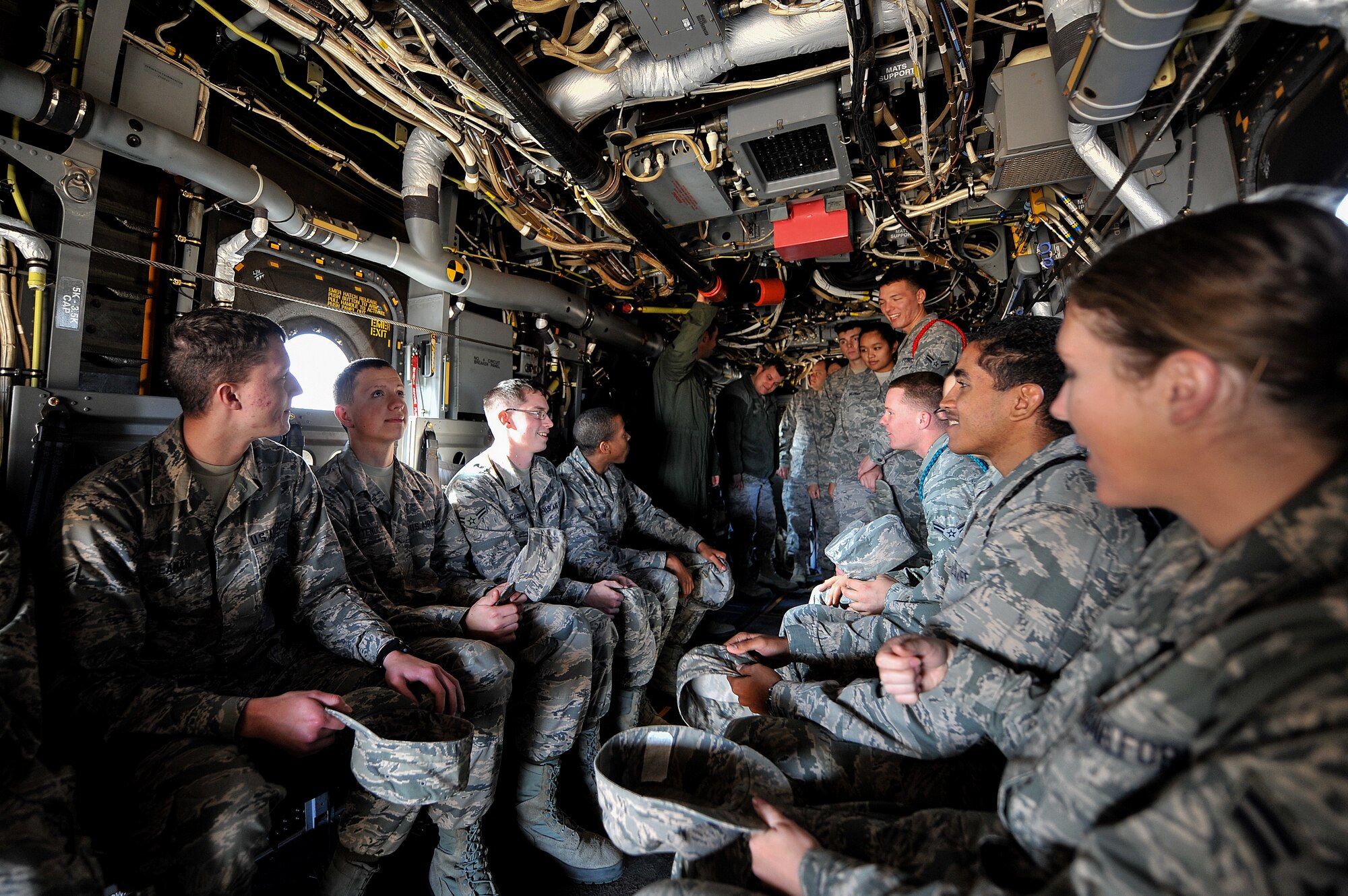 GOODFELLOW AIR FORCE BASE, Texas – 17th Training Group intelligence students study the inside of a CV-22 Osprey visiting from Cannon Air Force Base Dec. 8. Opportunities like this give students a hands-on experience, allowing them to have a bigger picture of their job in the operational Air Force. (U.S. Air Force photo/ Airman 1st Class Devin Boyer)