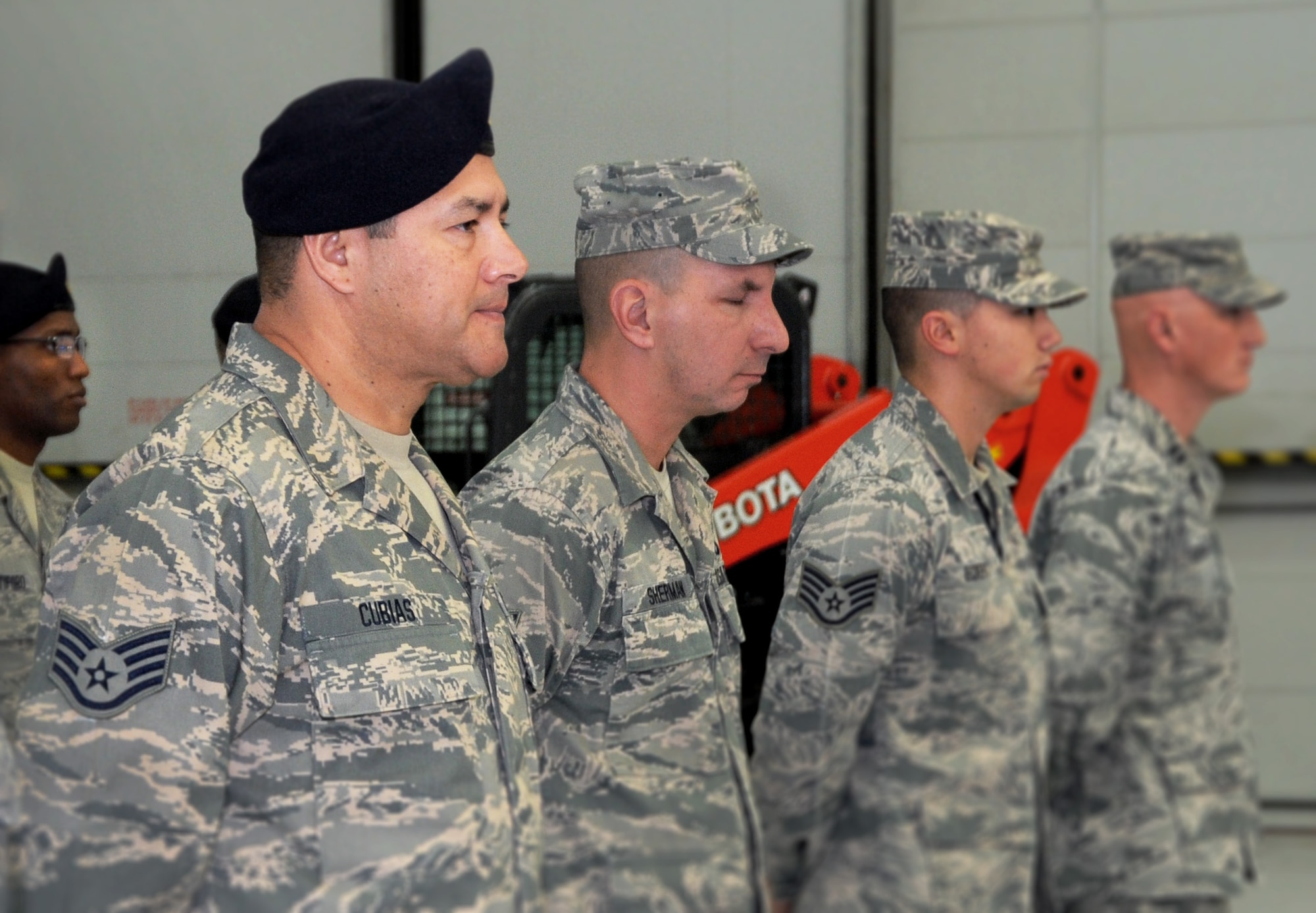 Oregon Staff Sgt. Joseph Cubias, assigned to the 142nd Fighter Wing Security Forces Squadron, stands in formation and listens to remarks during the Demobilization Ceremony for the 142nd Fighter Wing Civil Engineer Squadron and Security Forces Squadron at the Portland Air National Guard Base, Ore., Dec. 7, 2014. (U.S. Air National Guard photo by Tech. Sgt. John Hughel, 142nd Fighter Wing Public Affairs/Released)