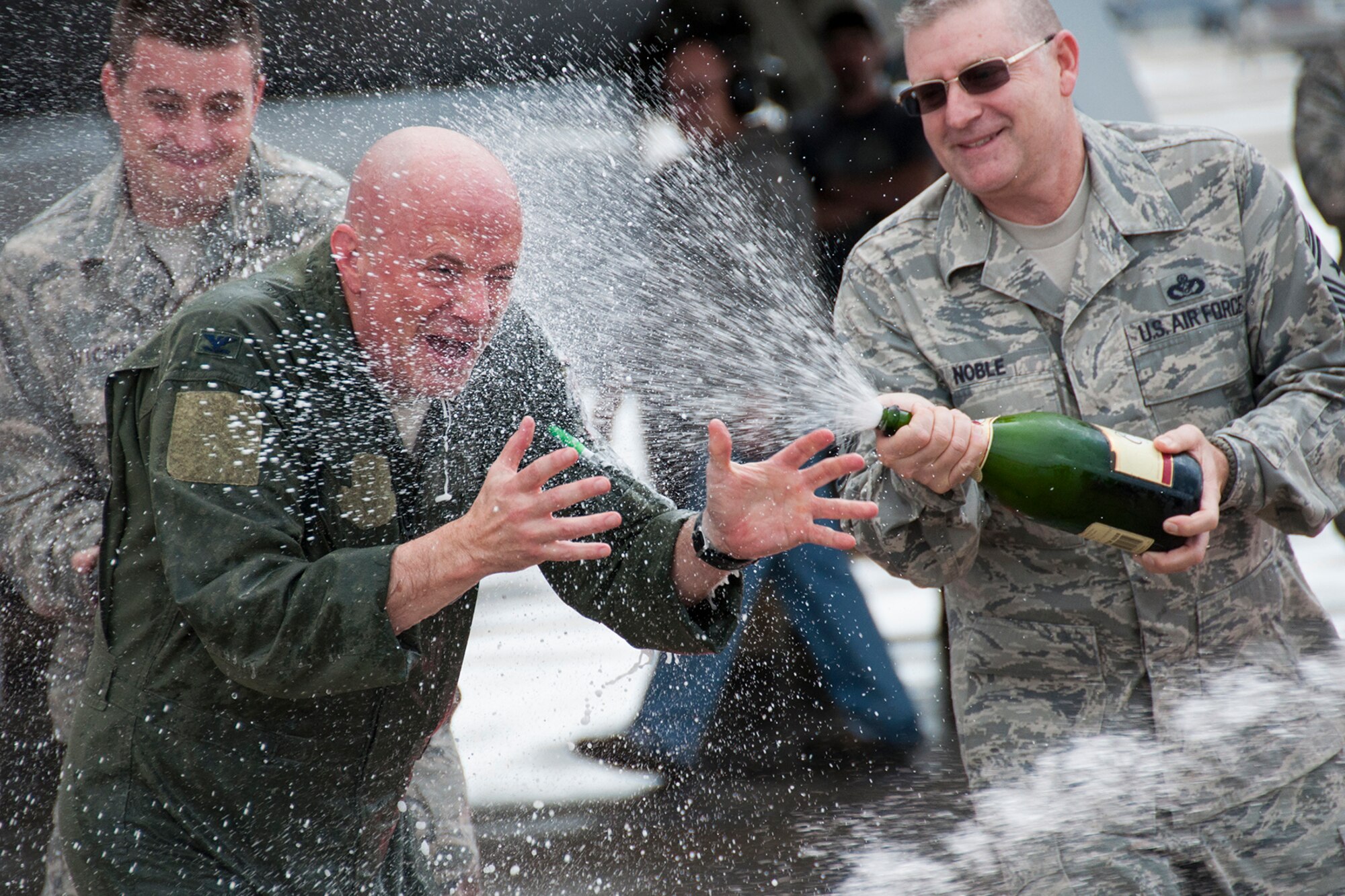 U.S. Air Force Col. Jonathan Ellis, 307th Bomb Wing commander, whose quick wit earned him the call sign "Jester", finds out the joke is on him after climbing out of the cockpit of his B-52 Stratofortress, Dec. 5, 2014, Barksdale Air Force Base, La. This marked the last flight for Ellis who relinquished command of the wing on Dec. 7, 2014.  (U.S. Air Force photo by Tech. Sgt. Ted Daigle/Released)