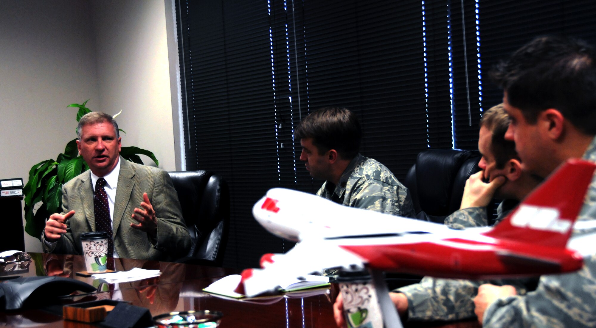 Mark Gordon, Contingency Operations director for Final Mile Logistics, speaks to Air Force Fellows at the FML facility in Atlanta, Ga., Dec. 8, 2014. Five majors from AMC came to the Atlanta area the week of Dec. 8 through 10 to speak to civilian business leaders as part of the Joint Mobility Fellowship Program. (U.S. Air Force photo by Senior Airman Daniel Phelps)