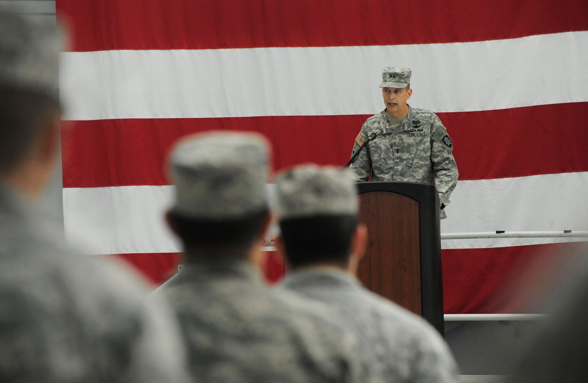 Maj. Gen. Daniel R. Hokanson, The Adjutant General, Oregon, address those in attendance at the Demobilization Ceremony for the 142nd Fighter Wing Civil Engineer Squadron and Security Forces Squadron at the Portland Air National Guard Base, Ore., Dec. 7, 2014. (U.S. Air National Guard photo by Tech. Sgt. John Hughel, 142nd Fighter Wing Public Affairs/Released)