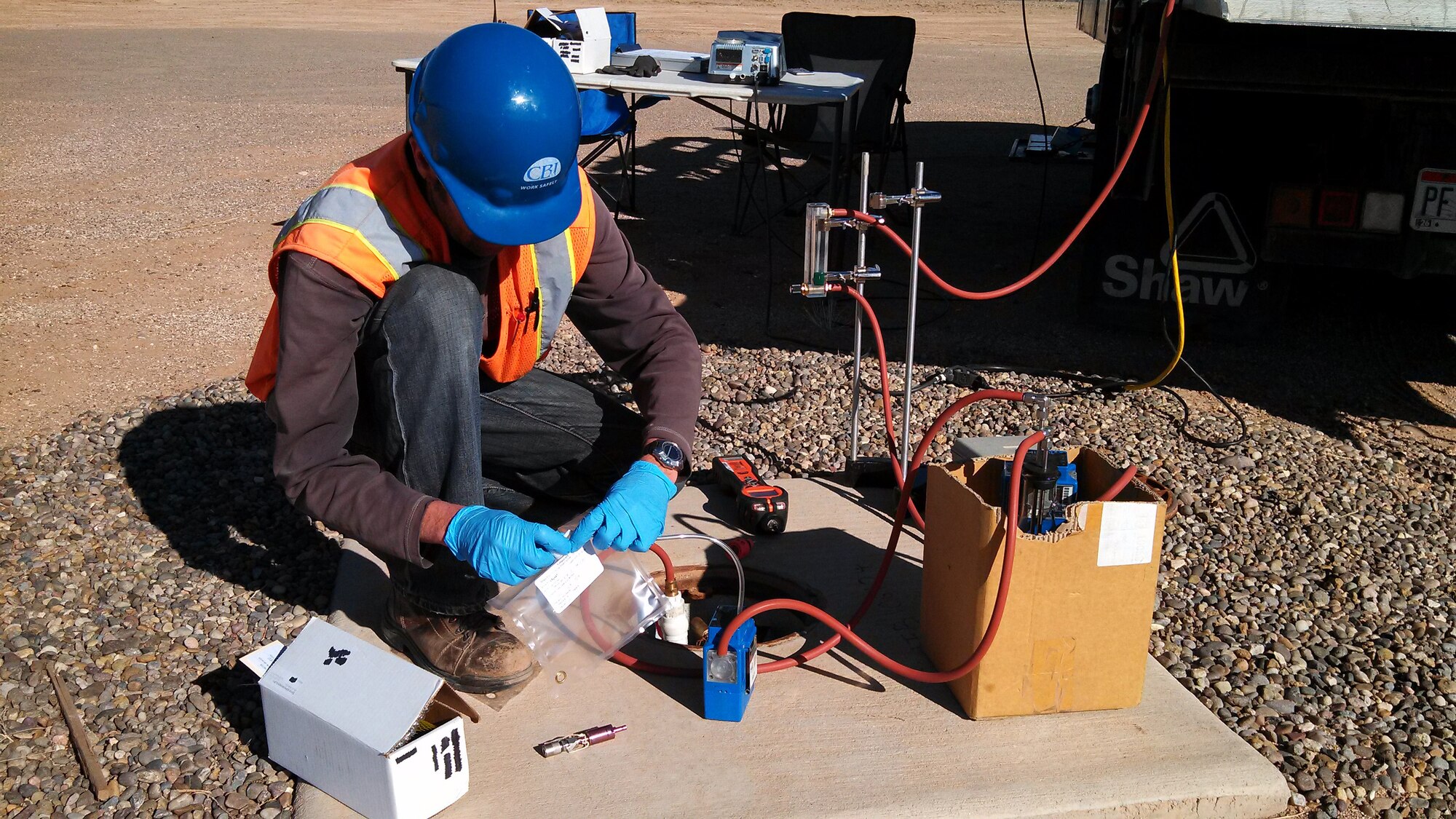 An Air Force contractor prepares equipment to test fuel-contaminated soil at Kirtland Air Force Base, New Mexico. The work being done is part of a performance-based contract to remediate the fuel plume associated with a bulk fuel storage facility. Executed by the Air Force Civil Engineer Center, PBR contracts encourage innovation, save money and eliminate delays. (Courtesy photo)