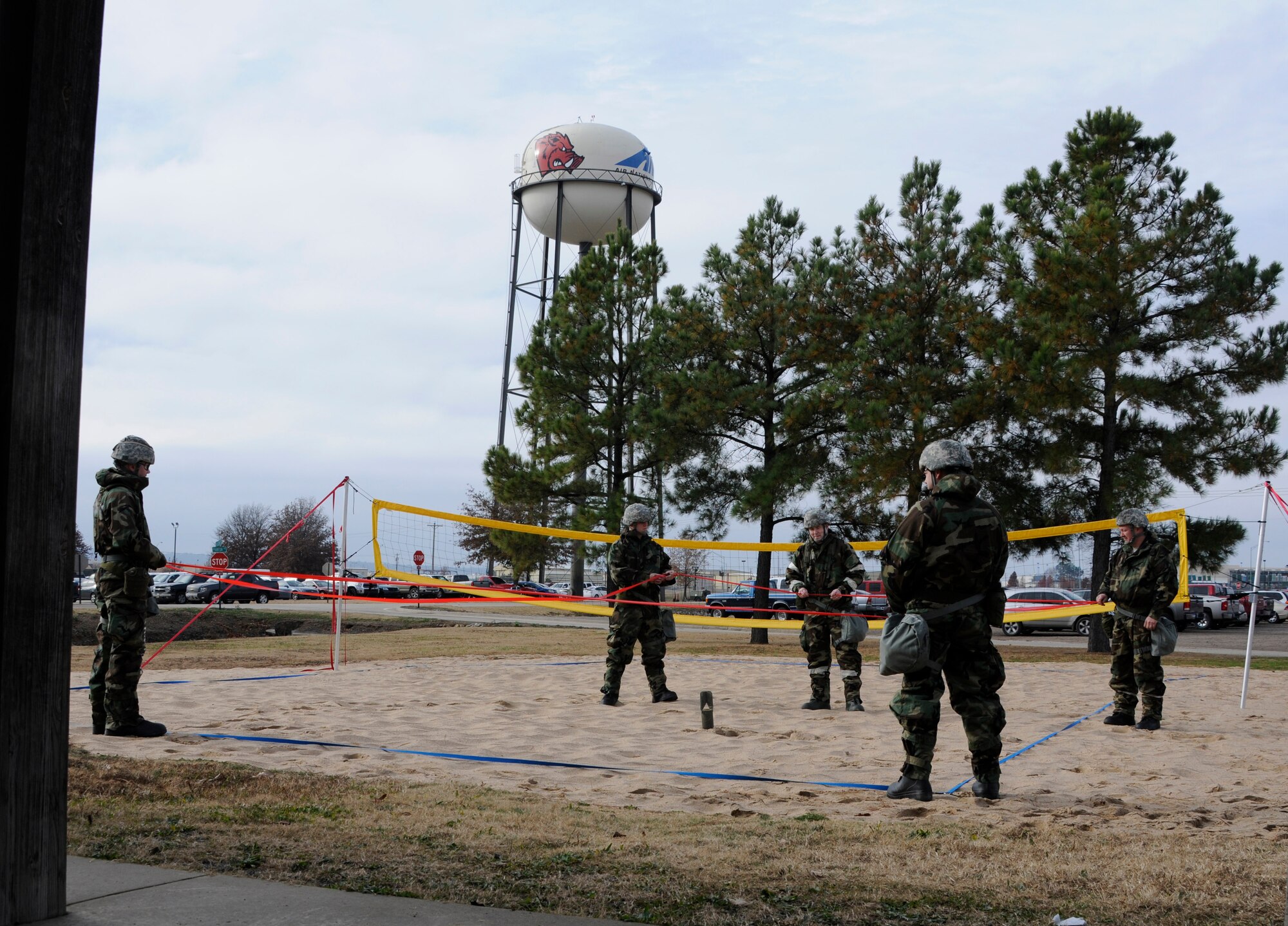 Airmen assigned to the 188th Wing cordon a simulated unexploded ordinance during an expeditionary skills rodeo at Ebbing Air National Guard Base, Fort Smith, Ark., Dec. 7, 2014. An ESR will be conducted quarterly to ensure Airmen maintain current on self-aid and buddy care training and chemical, biological, radiological and nuclear training. (U.S. Air National Guard photo by Staff Sgt. Hannah Dickerson/Released)