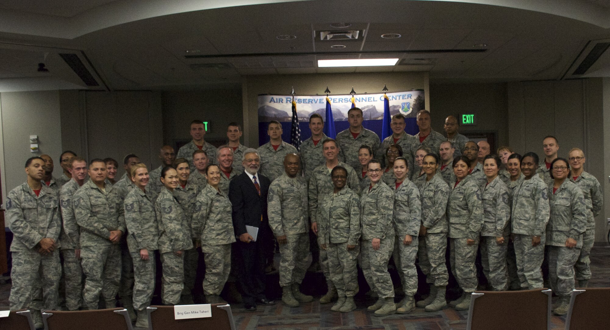 Air National Guard members have their photo taken with Brig. Gen. Michael R. Taheri, Air National Guard Readiness Center commander, Richard Rico, ANGRC director of staff, and Chief Master Sergeant Tony Whitehead, ANGRC command chief master sergeant, after attending a commander’s call hosted by the ANGRC commander at the Air Reserve Personnel Center Dec. 5, 2014, on Buckley Air Force Base, Colo. (U.S. Air Force photo/Master Sgt. Rick Grybos)