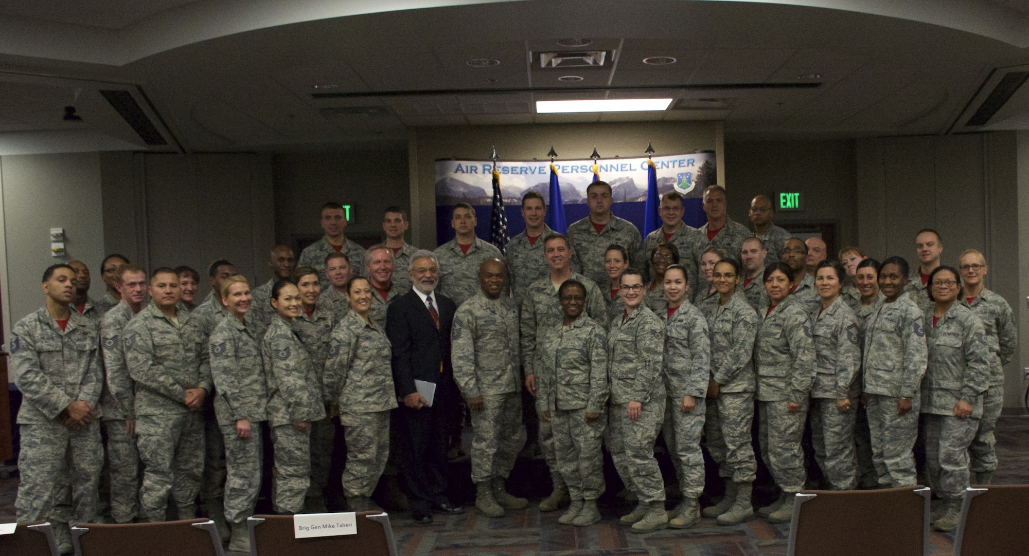 Air National Guard members have their photo taken with Brig. Gen. Michael R. Taheri, Air National Guard Readiness Center commander, Richard Rico, ANGRC director of staff, and Chief Master Sergeant Tony Whitehead, ANGRC command chief master sergeant, after attending a commander’s call hosted by the ANGRC commander at the Air Reserve Personnel Center Dec. 5, 2014, on Buckley Air Force Base, Colo. (U.S. Air Force photo/Master Sgt. Rick Grybos)