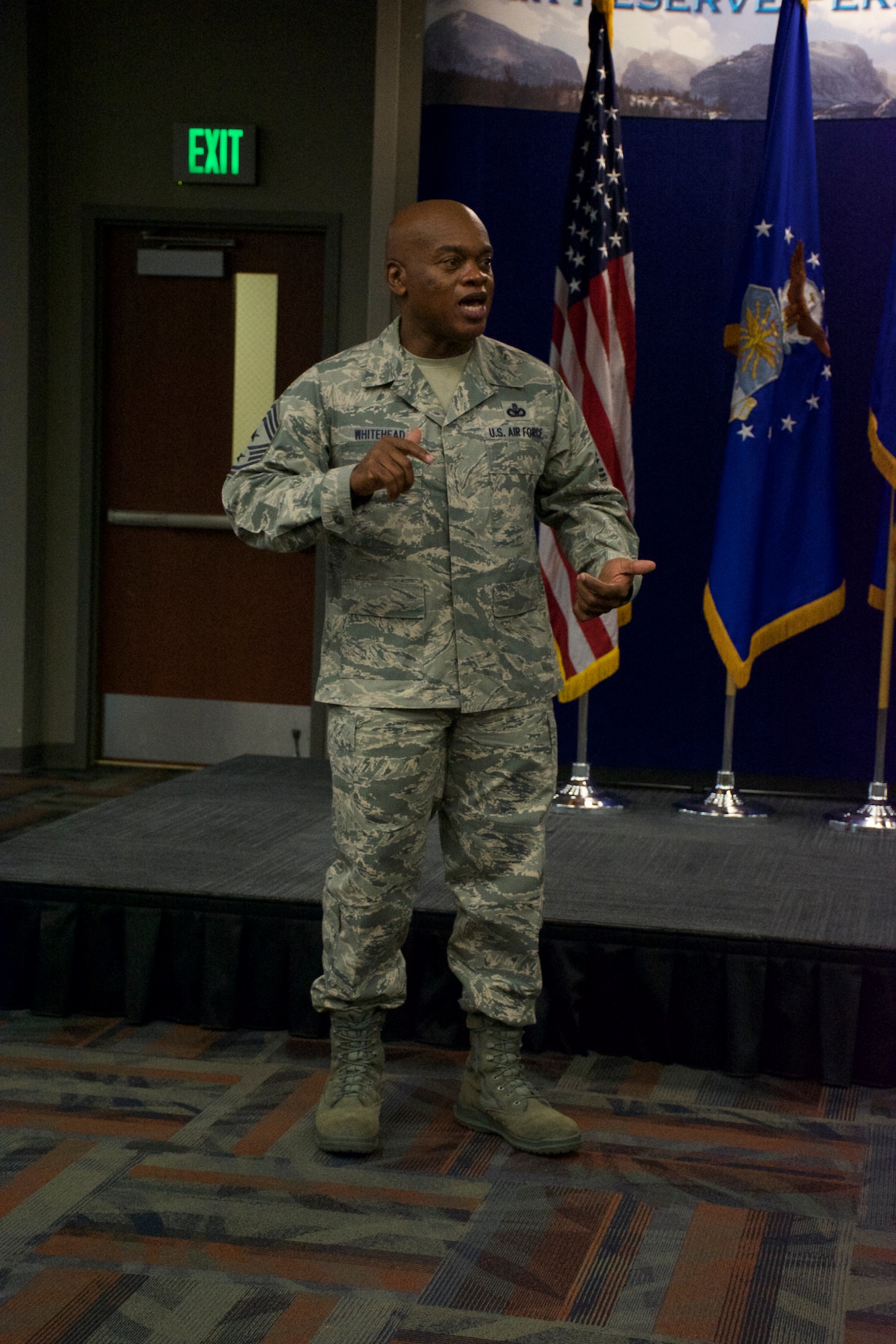 Chief Master Sergeant Tony Whitehead, Air National Guard Readiness Center command chief master sergeant, speaks to members of the Guard members at the Air Reserve Personnel Center Dec. 5, 2014, on Buckley Air Force Base, Colo. Whitehead, along with Brig. Gen. Michael R. Taheri, ANGRC commander, and Richard Rico, ANGRC director of staff, held a commander’s call during their visit to ARPC. (U.S. Air Force photo/Master Sgt. Rick Grybos)