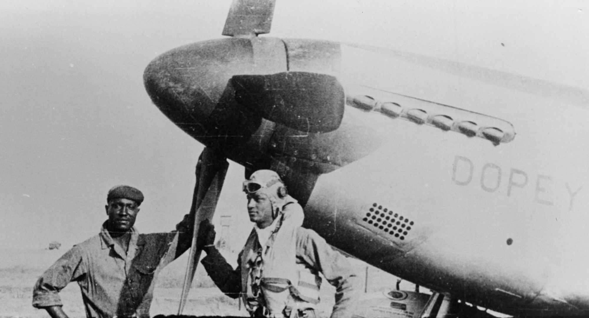 1st Lt. Walter Westmoreland with his P-51C nicknamed Dopey. A member of the 302nd Fighter Squadron, he was shot down by enemy ground fire near Lake Balaton, Hungary, in October 1944 while returning from an escort mission to Blechhammer, Germany. (U.S. Air Force photo)