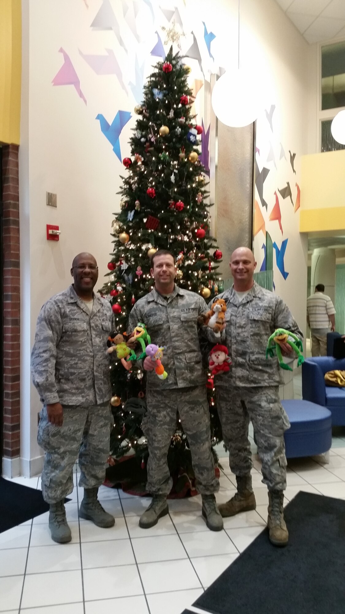 The 178th Wing Chaplain Corps visited children at the Dayton Children’s Hospital Dec. 4 to deliver some holiday cheer to children who are spending the holiday season in the hospital. Chaplain Maj. Joseph Branch, along with chaplain assistants Master Sgt. Michael Golden and Staff Sgt. Robert Schaefer visited 26 children and passed out stuffed animals, dolls, play jewelry and toy cars which were provided by the wing’s Airman Family Readiness. (Courtesy photo)