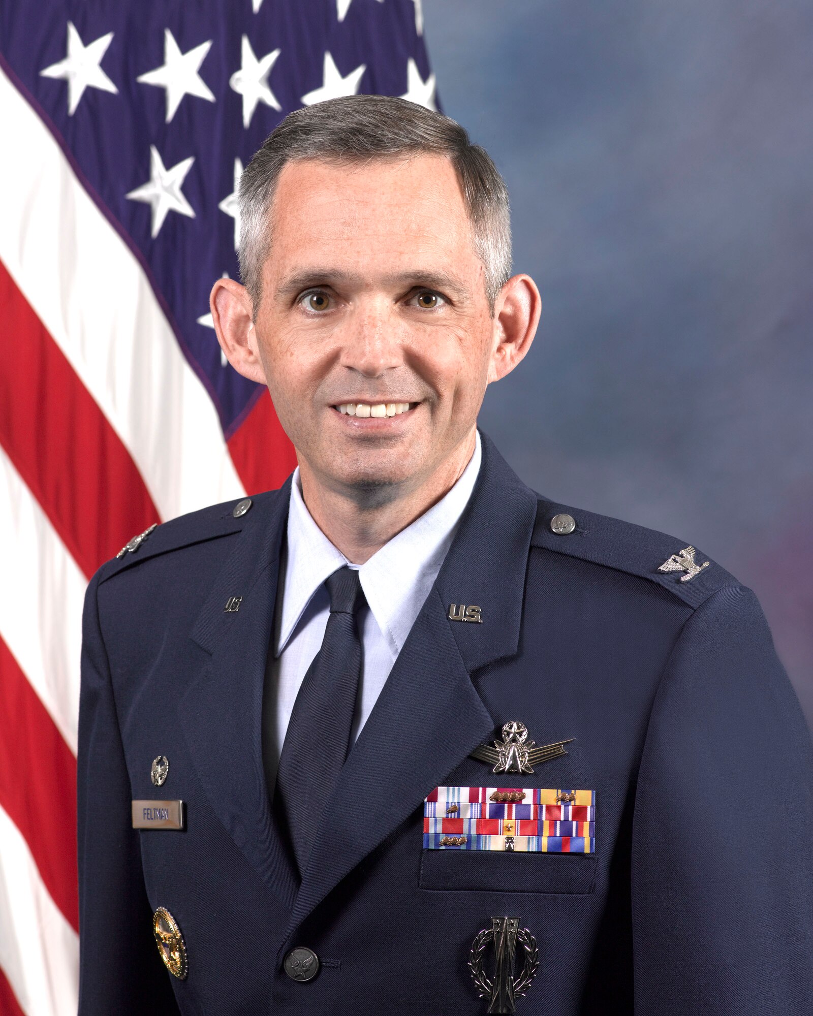 Col. Damon Feltman, 310th Space Wing commander
