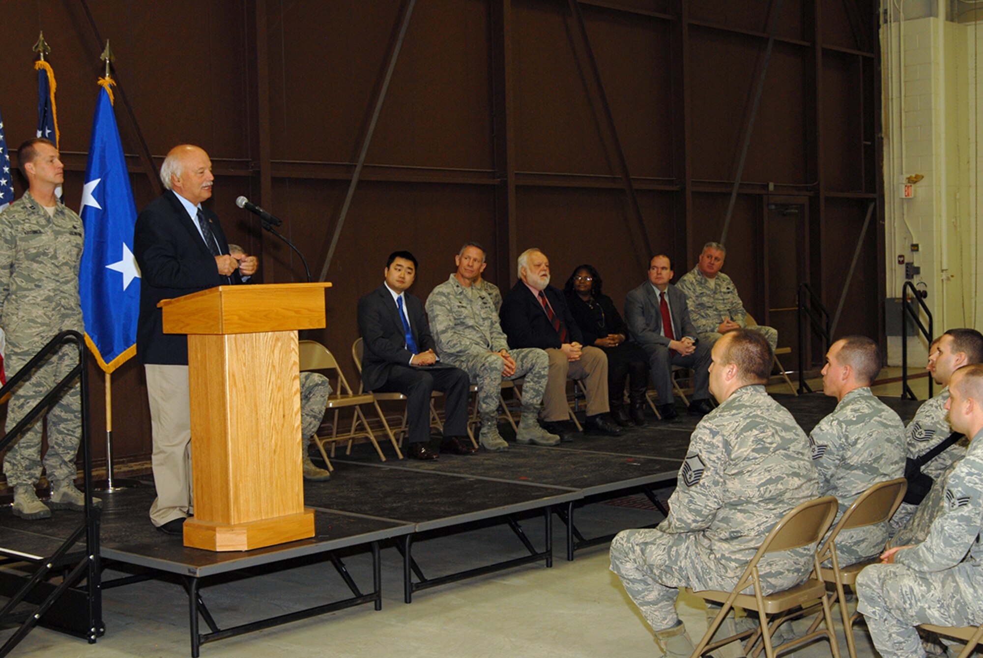 State Representative from Ohio’s 74th House district, Bob Hackett, addresses members, friends and family of the 178th Wing during a welcome home ceremony at the Springfield Air National Guard Base, Dec. 7, 2014.  Twenty Airmen were honored for deploying overseas in the past year. (Ohio Air National Guard photo by Master Sgt. Seth Skidmore/Released)