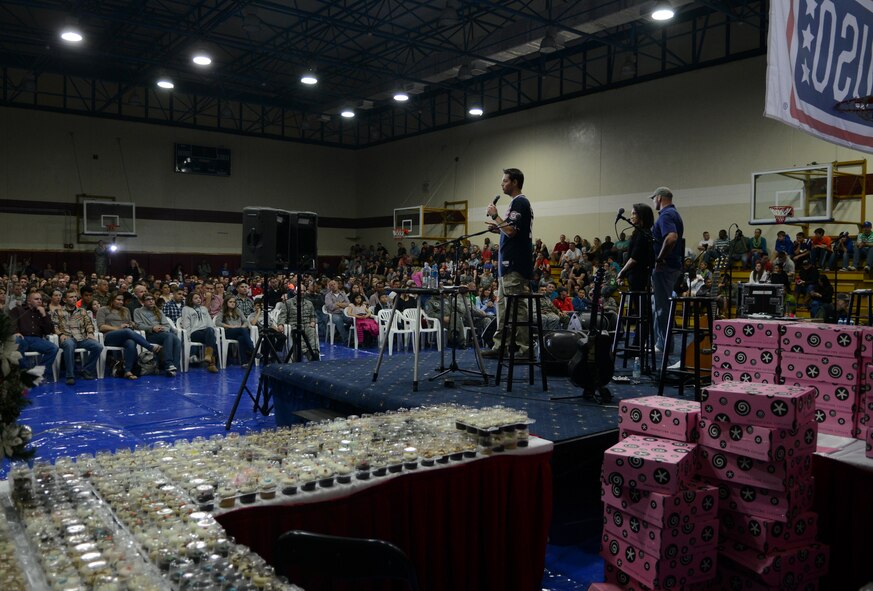 Doug Fister, Washington Nationals pitcher, Meghan Markle, actress, and Brian Urlacher, Chicago Bears pro-bowler and former linebacker, entertain members of the Incirlik community in attendance during a United Service Organizations holiday tour Dec. 8, 2014, at Incirlik Air Base, Turkey. The USO tour included several celebrities and the Chairman of the Joint Chiefs of Staff, Gen. Martin Dempsey. (U.S. Air Force photo by Staff Sgt. Caleb Pierce/Released)