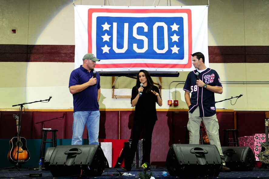 Brian Urlacher, left, a former Chicago Bears linebacker, Meghan Markle, center, star of the TV drama “Suits” and Doug Fister, right, Washington Nationals pitcher, speak during a United Service Organizations holiday tour Dec. 8, 2014, at Incirlik Air Base, Turkey. The tour features six celebrities and is led by the Chairman of the Joint Chiefs of Staff. The tour is visiting multiple overseas locations to preform concerts for service members and their families.  (U.S. Air Force photo by Senior Airman Krystal Ardrey/Released)