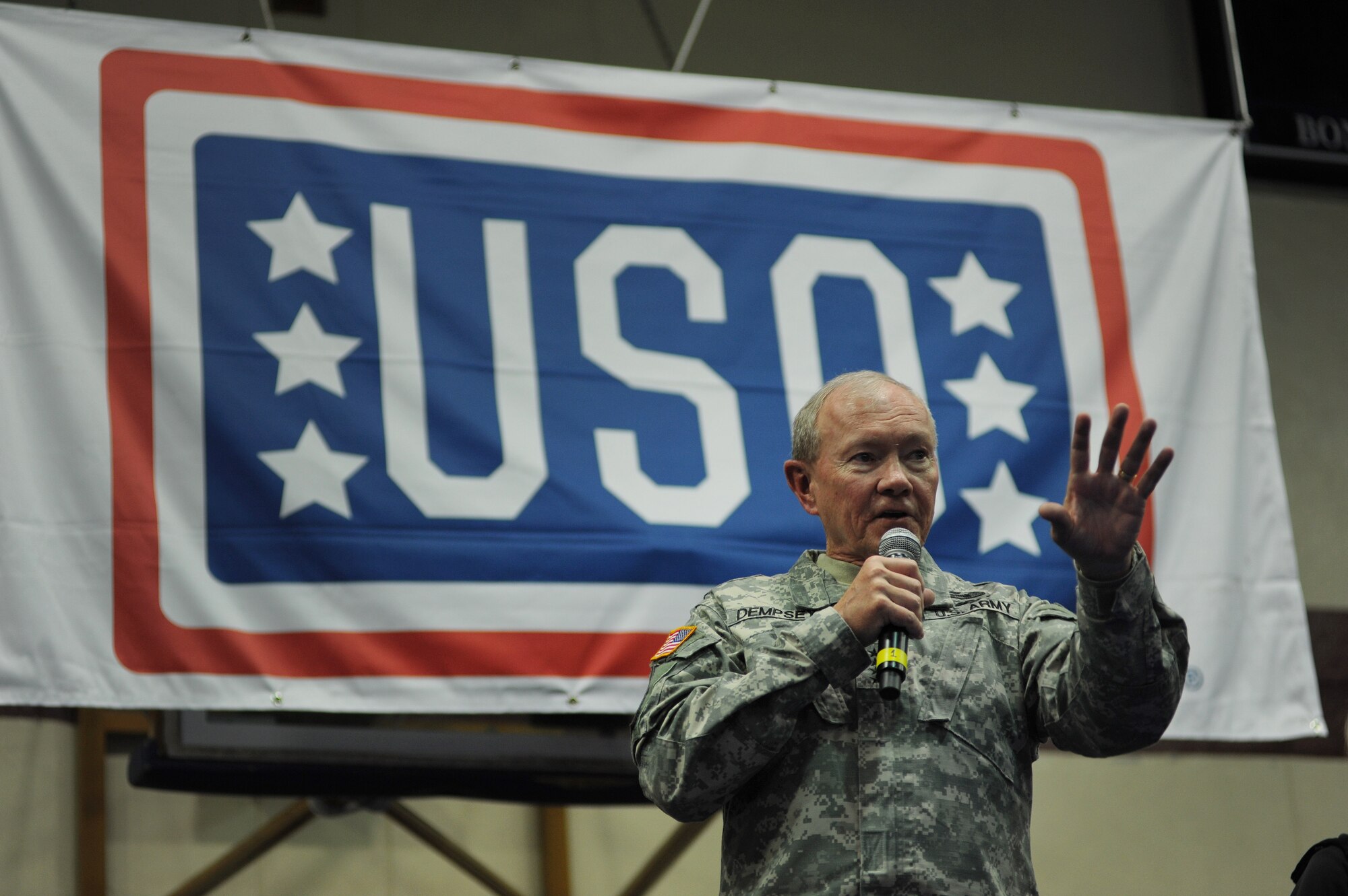 Chairman of the Joint Chiefs of Staff, Gen. Martin Dempsey, speaks to service members and their families during a United Service Organizations holiday tour Dec. 8, 2014, at Incirlik Air Base, Turkey. This tour marks Dempsey’s fourth and final tour as the CJCS. (U.S. Air Force photo by Senior Airman Krystal Ardrey /Released)