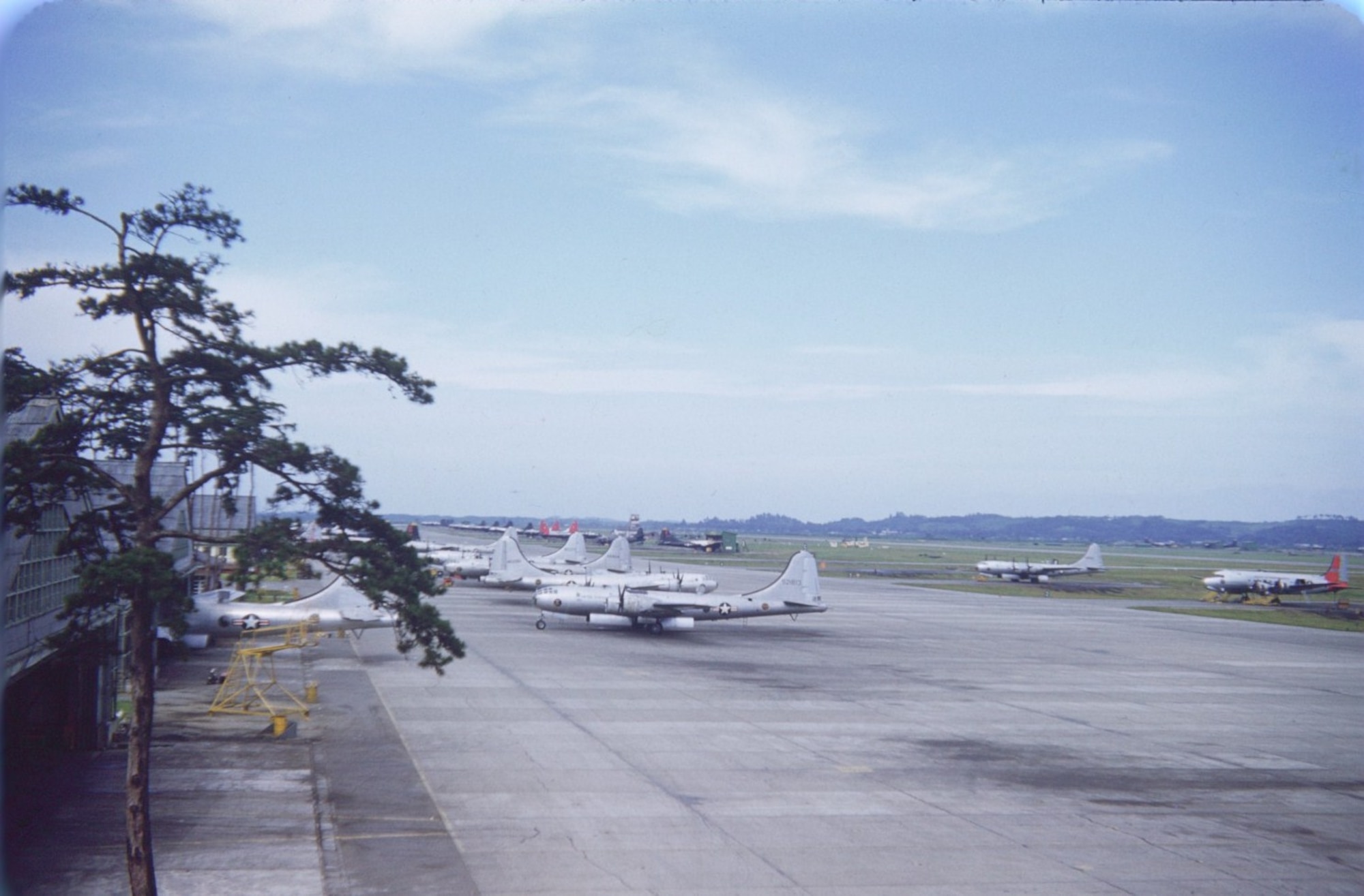 A view of Yokota's flightline looking north during the Korean War. All
but one of the planes is a type of B-29 Superfortress. (Photo courtesy of James Howell)