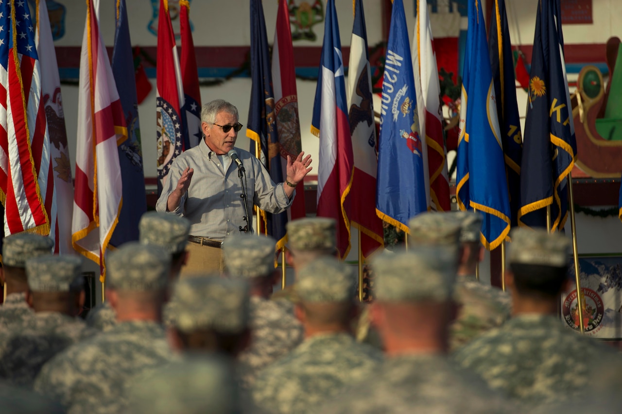 Defense Secretary Chuck Hagel addresses U.S. service members during a visit to Camp Beuhring, Kuwait, Dec. 8, 2014. DoD photo by Air Force Master Sgt. Adrian Cadiz