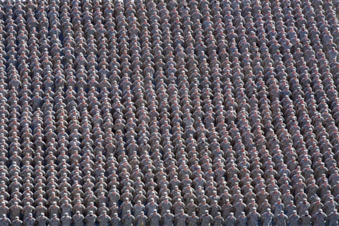 Arizona National Guard members from across the state stand in one formation for the first time in over a century during a community expo at Arizona State University’s Sun Devil Stadium in Tempe, Ariz., Dec. 7, 2014. More than 3,800 Guardsmen participated in the historic event.