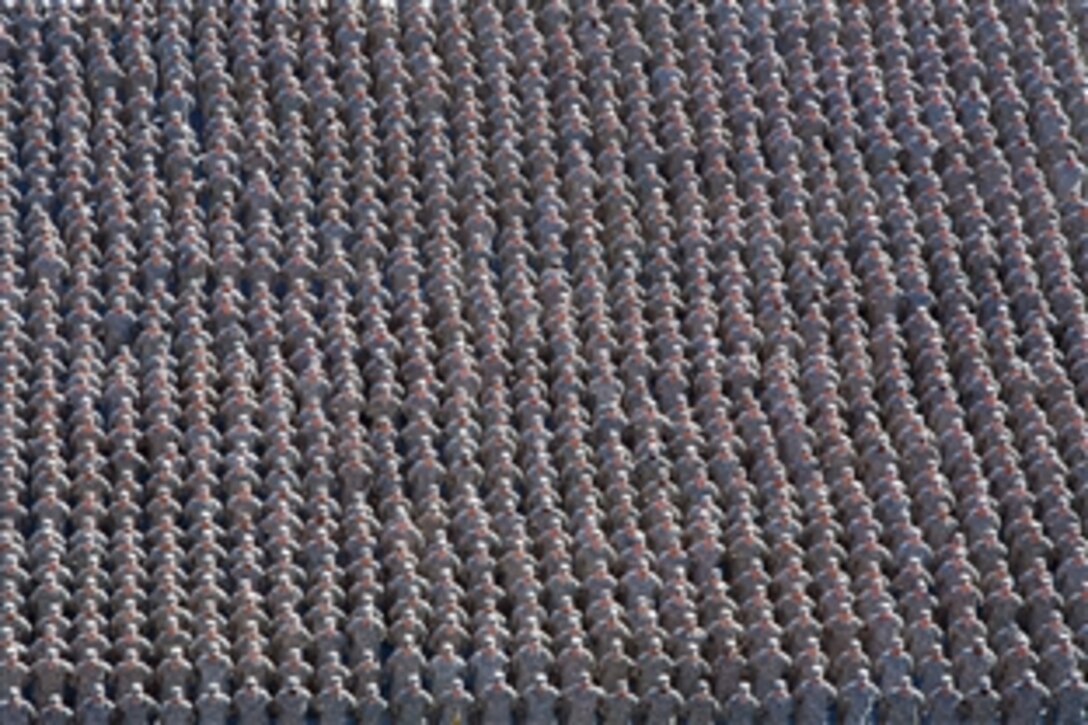 Arizona National Guard members from across the state stand in one formation for the first time in over a century during a community expo at Arizona State University’s Sun Devil Stadium in Tempe, Ariz., Dec. 7, 2014. More than 3,800 Guardsmen participated in the historic event. 