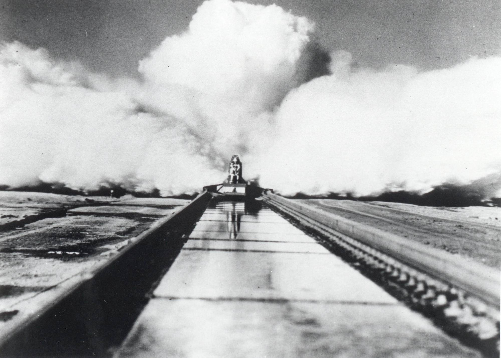 On December 10, 1954, Col. John P. Stapp propelled down the Holloman High Speed Test Track aboard the Sonic Wind Rocket Sled 1 at a rate of 632 miles per hour, earning the title "The Fastest Man on Earth." Stapp’s experiment was the last human test at the HHSTT. His findings proved a pilot flying at 35,000 feet, going twice the speed of sound, could withstand the wind blast if he or she had to eject. (Courtesy Photo)