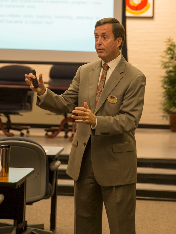 Tom Gill, transition seminar advisor supervisor with Marine and Family Programs Division, speaks to during a Transition Readiness Seminar session at the Education Center aboard Marine Corps Base Camp Lejeune, Aug. 15. TRS offers courses that service members and their families can take advantage of from the beginning of a service member’s career, past separation or retirement and until he or she leaves the workforce, said Gill.