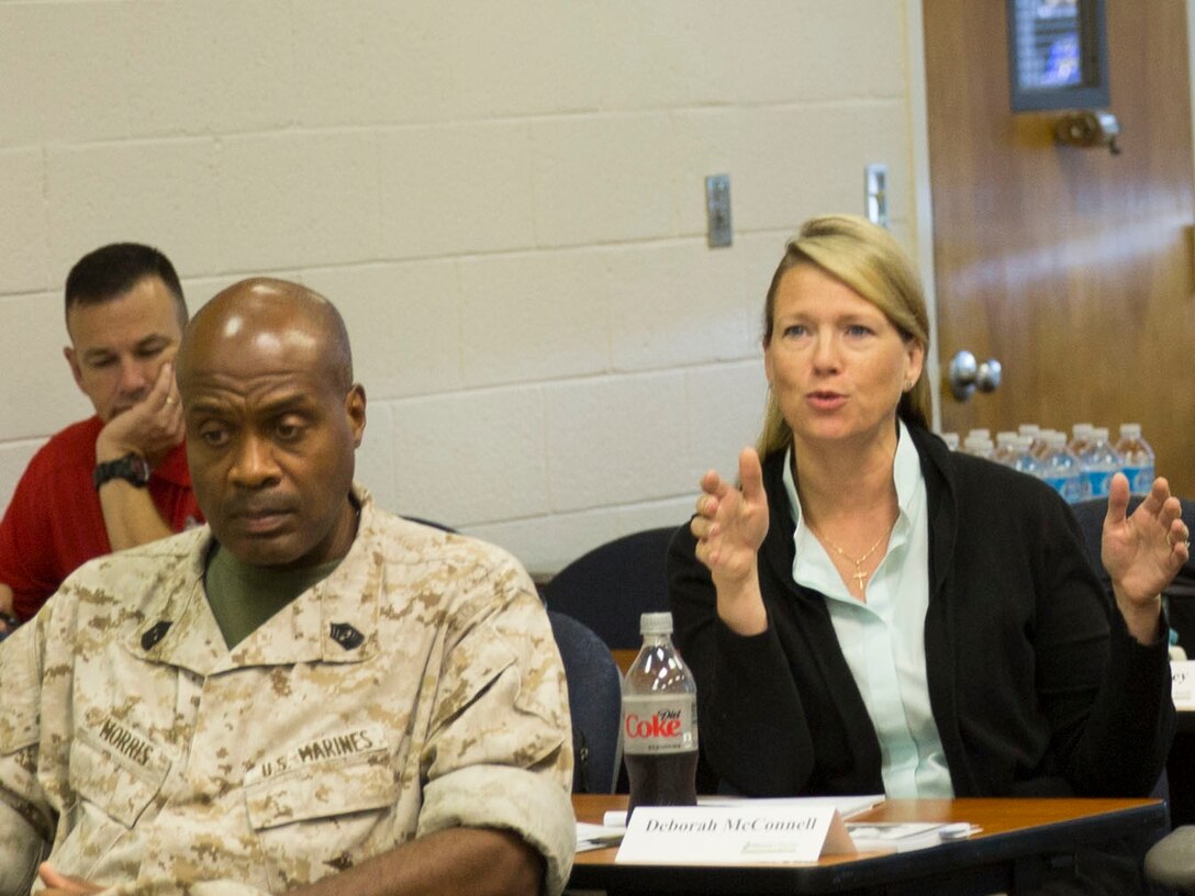 Col. Deborah McConnell, a judge with the Eastern Judicial Circuit speaks during a Transition Readiness Seminar session at the Education Center aboard Marine Corps Base Camp Lejeune, Aug. 15. While McConnell does not expect to separate from the military soon she attended courses to learn about the separation process. 