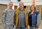 Army Sgt. Nathan Darrach, of Joint Force Headquarters, stands with Darrol Birk and Birk’s girlfriend, Brenda Nelson, after being presented the South Dakota National Guard Medal for Valor, Dec. 6, 2014, in Rapid City, S.D., for heroism displayed while assisting Birk in a
fatal three-vehicle crash. 