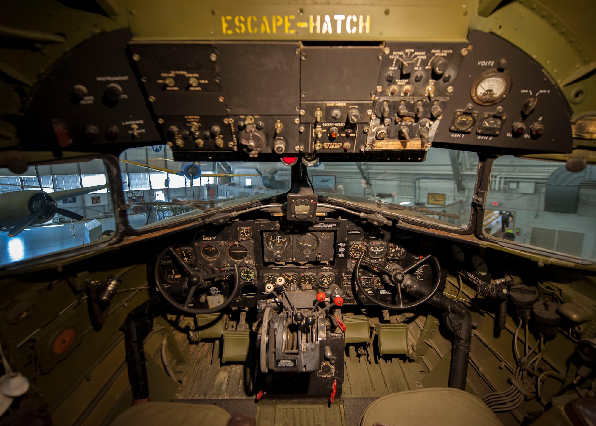 The cockpit of the C-47A Skytrain, the “Turf and Sport Special,” sits on display Nov. 15, 2014, inside the Air Mobility Command Museum on Dover Air Force Base, Del. This type of aircraft carried personnel and cargo, and in a combat role, towed troop-carrying gliders and dropped paratroopers into enemy territory. (U.S. Air Force photo/Airman 1st Class Zachary Cacicia)