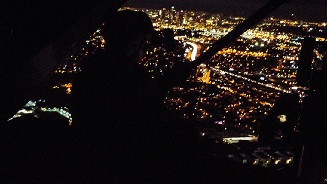 U.S. Marines with the 15th Martine Expeditionary Unit’s Maritime Raid Force conduct a raid during realistic urban training at Dodger Stadium in Los Angeles Dec. 8, 2014. RUT prepares the Marines of the 15th MEU for their upcoming deployment by enhancing their combat skills in environments they may encounter in future missions. (U.S. Marine Corps photo by Cpl. Anna Albrecht/Released)