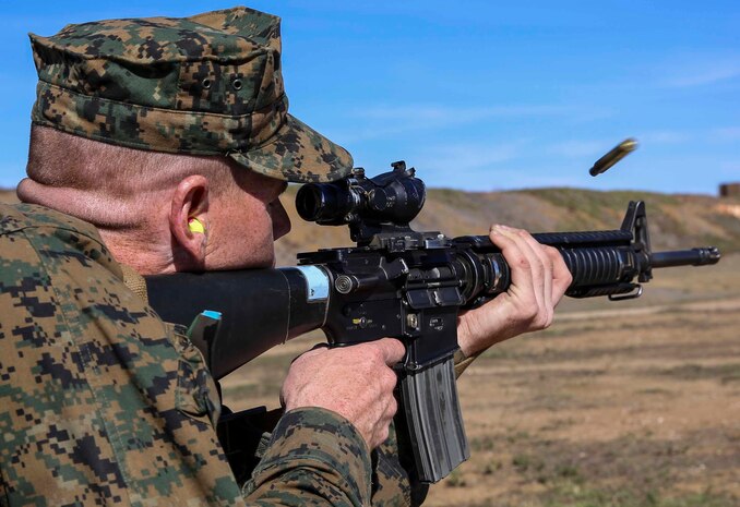 Recruit Blake S. Sunkle, Platoon 3229, Kilo Company, 3rd Recruit Training Battalion, aims in at the target in the prone position from the 500-yard line at Edson Range, Weapons and Field Training Battalion, Marine Corps Base Camp Pendleton, Calif., Nov. 24. Recruits are required to fire the 200, 300 and 500-yard lines in order to qualify.