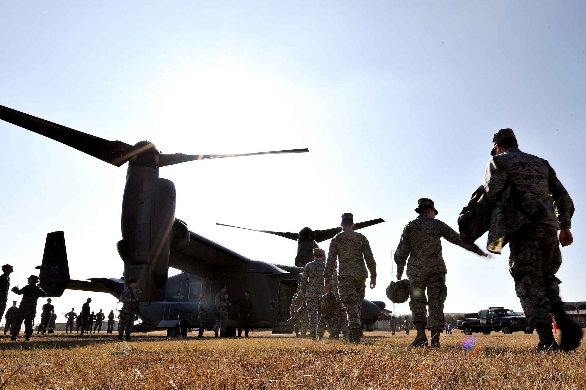 17th Training Group students board a CV-22 Osprey Dec. 8, 2014 at Goodfellow Air Force Base, Texas. Pilots from the 20th Special Operations Squadron flew the Osprey to Goodfellow to provide intelligence students an orientation on special operations missions and aircraft that they may support after graduation. (U.S. Air Force photo/Airman 1st Class Devin Boyer)