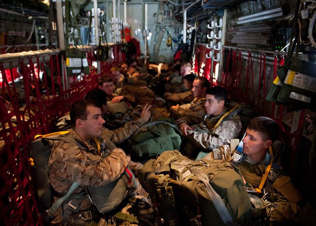 U.S. Army Paratroopers assigned to 18th Airborne Corps Long Range Surveillance Company, wait to perform a static-line jump from a U.S. Air Force C-130J Hercules during the U.S. Air Force Weapons School's Joint Forcible Entry Exercise 14B over the Nevada Test and Training Range, Dec. 4, 2014. Their mission was to conduct an Airborne insertion over the exercise area and move to high ground to conduct reconnaissance and surveillance operations in support of JFEX. (U.S. Air Force photo by Senior Airman Thomas Spangler)