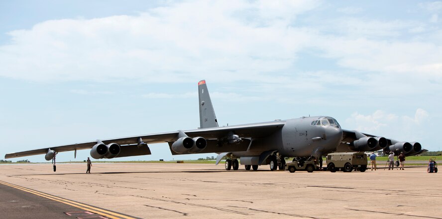 A U.S. Air Force B-52 Stratofortress bomber, deployed to Anderson Air Force Base, Guam, from Minot Air Force Base, N.D., lands at Royal Australian Air Force Base Darwin, Australia, Dec. 8, 2014. The aircraft operates out of Andersen as part of U.S. Pacific Command and U.S. Air Force rotational presence in the Pacific. This is the fourth time a B-52 has landed at RAAF Darwin since 2012 and will enhance the United States’ ability to train, exercise and operate with Australia and other partners across the region. (Royal Australian Navy photo by ABIS Nicolas Gonzalez/Released)