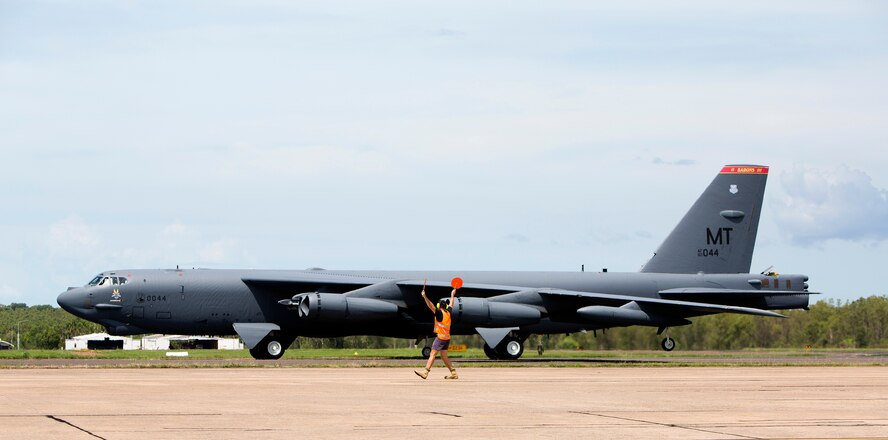 A U.S. Air Force B-52 Stratofortress bomber, deployed to Anderson Air Force Base, Guam, from Minot Air Force Base, N.D., lands at Royal Australian Air Force Base Darwin, Australia, Dec. 8, 2014. The aircraft operates out of Andersen as part of U.S. Pacific Command and U.S. Air Force rotational presence in the Pacific. This is the fourth time a B-52 has landed at RAAF Darwin since 2012 and will enhance the United States’ ability to train, exercise and operate with Australia and other partners across the region. (Royal Australian Navy photo by ABIS Nicolas Gonzalez/Released)
