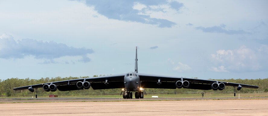 A U.S. Air Force B-52 Stratofortress bomber, deployed to Anderson Air Force Base, Guam, from Minot Air Force Base, N.D., lands at Royal Australian Air Force Base Darwin, Australia, Dec. 8, 2014. The aircraft operates out of Andersen as part of U.S. Pacific Command and U.S. Air Force rotational presence in the Pacific. This is the fourth time a B-52 has landed at RAAF Darwin since 2012 and will enhance the United States’ ability to train, exercise and operate with Australia and other partners across the region. (Royal Australian Navy photo by ABIS Nicolas Gonzalez/Released)