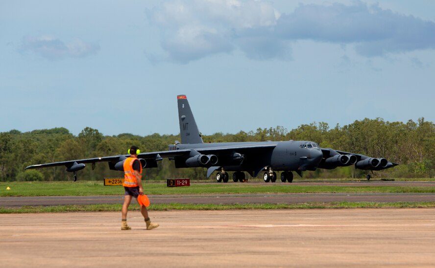 A U.S. Air Force B-52 Stratofortress bomber, deployed to Anderson Air Force Base, Guam, from Minot Air Force Base, N.D., lands at Royal Australian Air Force Base Darwin, Australia, Dec. 8, 2014. The aircraft operates out of Andersen as part of U.S. Pacific Command and U.S. Air Force rotational presence in the Pacific. This is the fourth time a B-52 has landed at RAAF Darwin since 2012 and will enhance the United States’ ability to train, exercise and operate with Australia and other partners across the region. (Royal Australian Navy photo by ABIS Nicolas Gonzalez/Released)