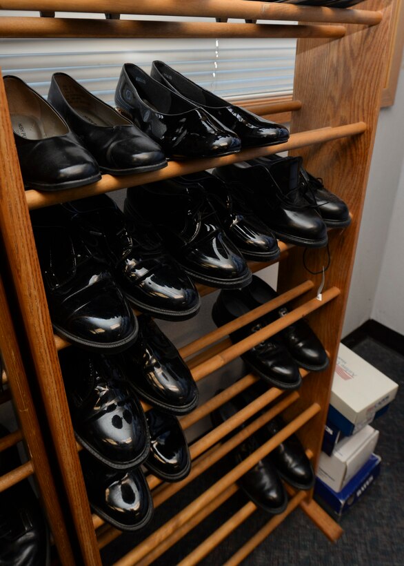 Serviceable shoes and boots of all sizes fill a rack to at the Diamond Mart on Ellsworth Air Force Base, S.D., Dec. 4, 2014. Due to the generous donations from active-duty and retired servicemembers, the Diamond Mart is able to provide an additional resource of uniformed clothing items for active-duty Airmen who may need replacement items. (U.S. Air Force photo by Senior Airman Anania Tekurio/Released)