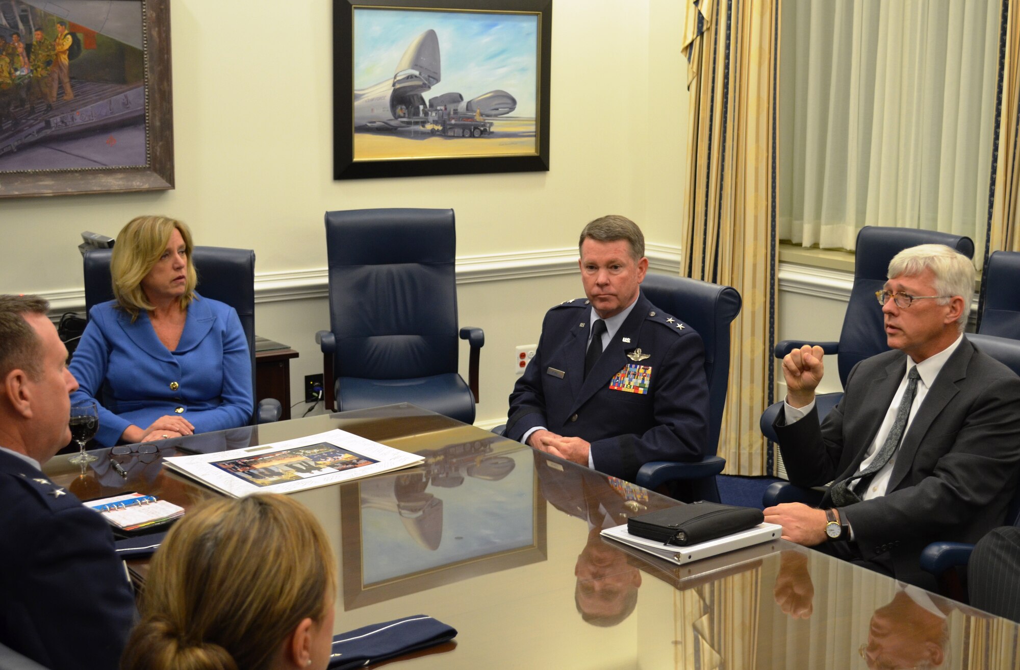 Secretary of the Air Force Deborah Lee James is briefed by the senior leaders of the Air Forces Reserve Policy Committee. She is seen here with Maj. Gen. Robert Millmann, mobilization assistant to the commander 7th Air Force, Maj. Gen. John Nichols, Texas adjutant general and Mr. Daniel R. Sitterly, principal deputy assistant secretary of the Air Force for manpower and reserve affairs. ARFPC reviews major policy matters that directly affect the reserve components and the Air Force’s mobilization preparedness.