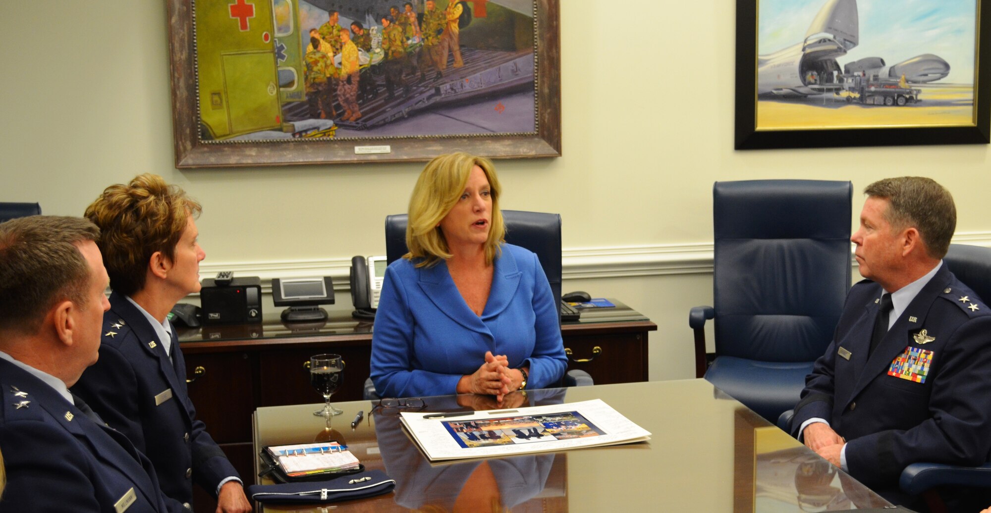 Secretary of the Air Force Deborah Lee James is briefed by the senior leaders of the Air Reserve Forces Policy Committee. She is seen here with Maj. Gen. Robert Millmann, mobilization assistant to the commander 7th Air Force, Maj. Gen. Jane Rohr, mobilization assistant to the commander Air Force Space Command, and Maj. Gen. John Nichols, Texas adjutant general. ARFPC reviews major policy matters that directly affect the reserve components and the Air Force’s mobilization preparedness.