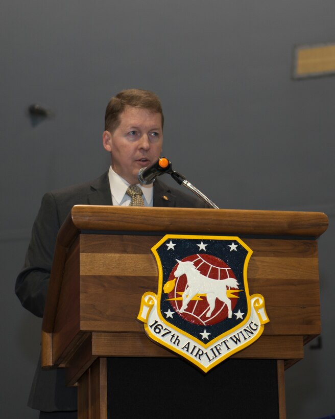 Mr. Mike Youngson, Defense Fellow for U.S. Senator Joe Manchin, speaks during the introduction ceremony for the C-17 Globemaster III at Martinsburg, W.Va. air base, Dec. 6. Distinguished guests, visitors and family members were at the wing, for the introduction ceremony for the C-17 Globemaster III. The unit is currently going through a conversion from the C5 Galaxy.  After the ceremony, guests and family members enjoyed tours of the C-17 aircraft, along with various activities for kids.  (Air National Guard photo by Tech. Sgt. Mike Dickson/Released)