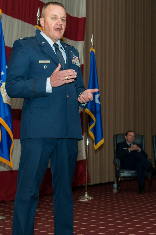 U.S. Air Force Col. Bruce Cox speaks during the 307th Bomb Wing Change of Command Ceremony, Dec. 7, 2014, Barksdale Air Force Base, La. Cox, is the former Director of Operations and Plans Directorate, 10th Air Force, Naval Air Station Joint Reserve Base Fort Worth, Texas. (U.S. Air Force photo by Master Sgt. Greg Steele/Released)