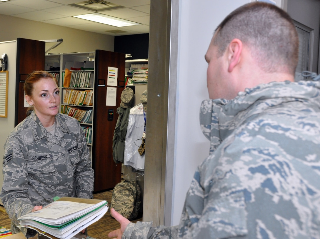 Senior Airman Courtney Schwenk, medical records health administrator with the 911th Aeromedical Staging Squadron, plays a vital part in deploying Airmen to theatres around the globe, making sure all personnel medical records on the base are complete and up to date.  (U.S. Air Force photo by Senior Airman Joseph Bridge)