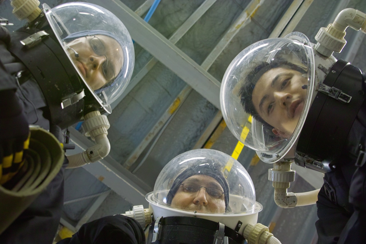 Left to right: Juho Vehvilainen, Greg Leonard and Victor Luo are on the same team with U.S. Army 1st Lt. Heidi Beemer. The team is competiting to be the first crew at Flashline Mars Arctic Research Station on Devon Island, Canada. U.S. Army photo by Yusuke Murakami