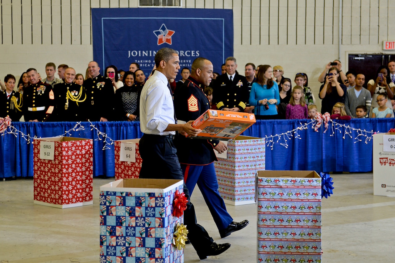 President Barack Obama participates in a Toys for Tots event on Joint Base Anacostia-Bolling in Washington, D.C., Dec. 10, 2014. DoD photo by EJ Hersom 