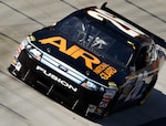 The new Number 26 Air National Guard car takes some practice laps at the Bristol Motor Speedway in preparation for the Food City 500 in Bristol, Tenn., this weekend. The car will be driven by David Stremme.