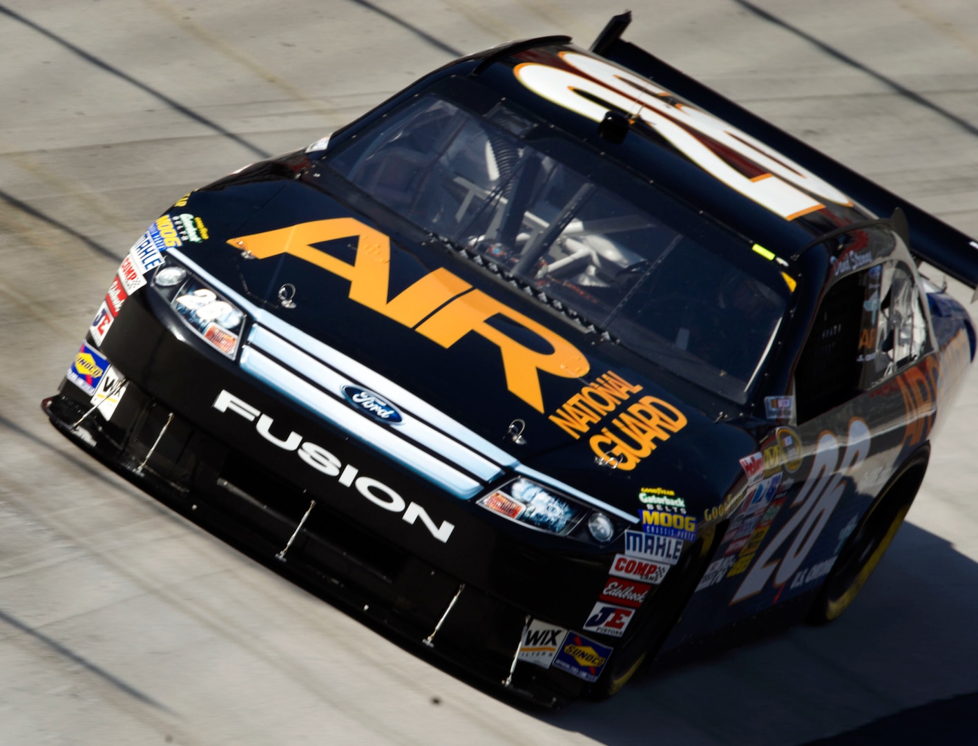 The new Number 26 Air National Guard car takes some practice laps at the Bristol Motor Speedway in preparation for the Food City 500 in Bristol, Tenn., this weekend. The car will be driven by David Stremme.