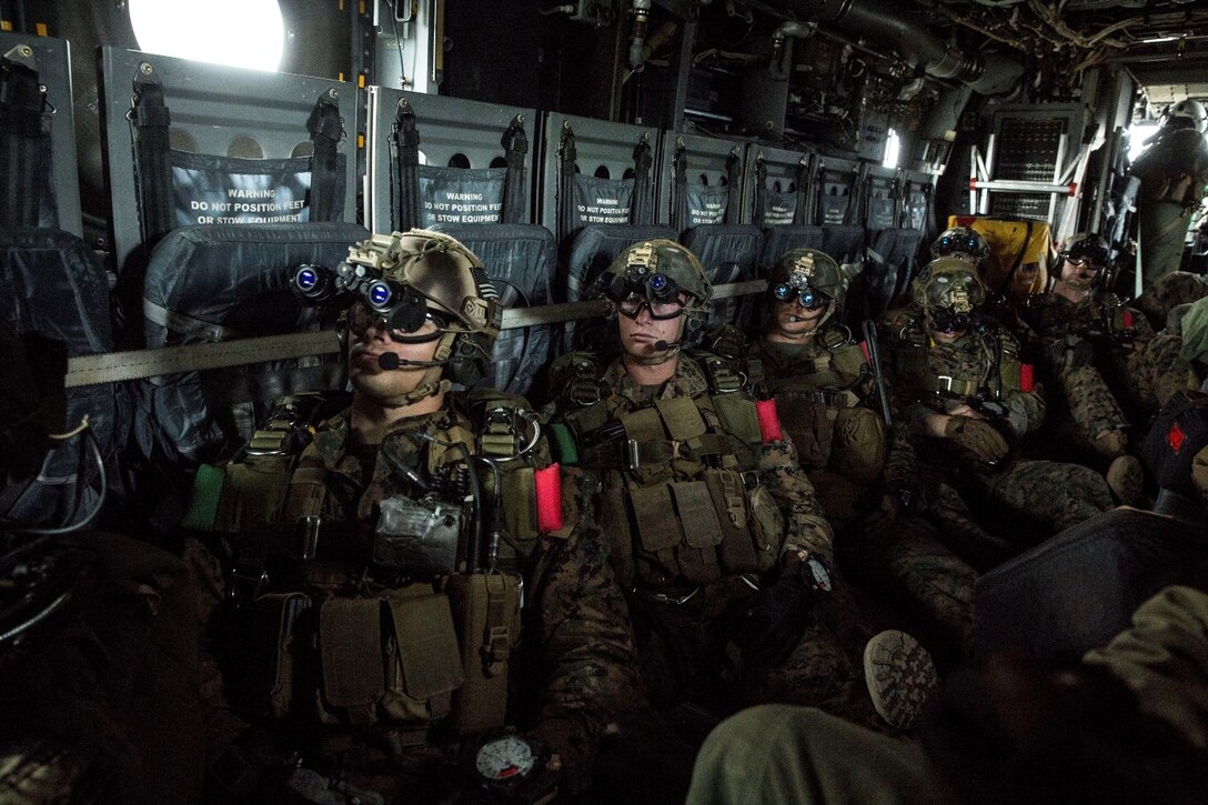 U.S. Marines with the Force Reconnaissance Detachment, 15th Marine Expeditionary Unit, conduct a static-line jump from an MV-22B Osprey during realistic urban training aboard Fort Hunter Liggett, Calif., Dec. 9, 2014. These Marines are part of the 15th MEU’s Maritime Raid Force. The purpose of RUT is to provide the MEU an opportunity to conduct training in unfamiliar environments in preparation for their upcoming deployment. (U.S. Marine Corps photo by Cpl. Anna Albrecht/Released)